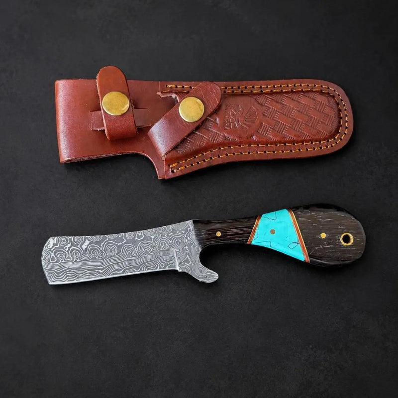 Titan International Titan "Malachite Range" Bull Cowboy Cutter | Sheepfoot
Damascus Steel | Turquoise Inlay Wenge & Malachite
Handle | Engraved Western Leather Sheath